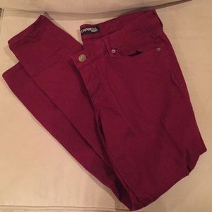 Express skinny jeans, burgundy.
